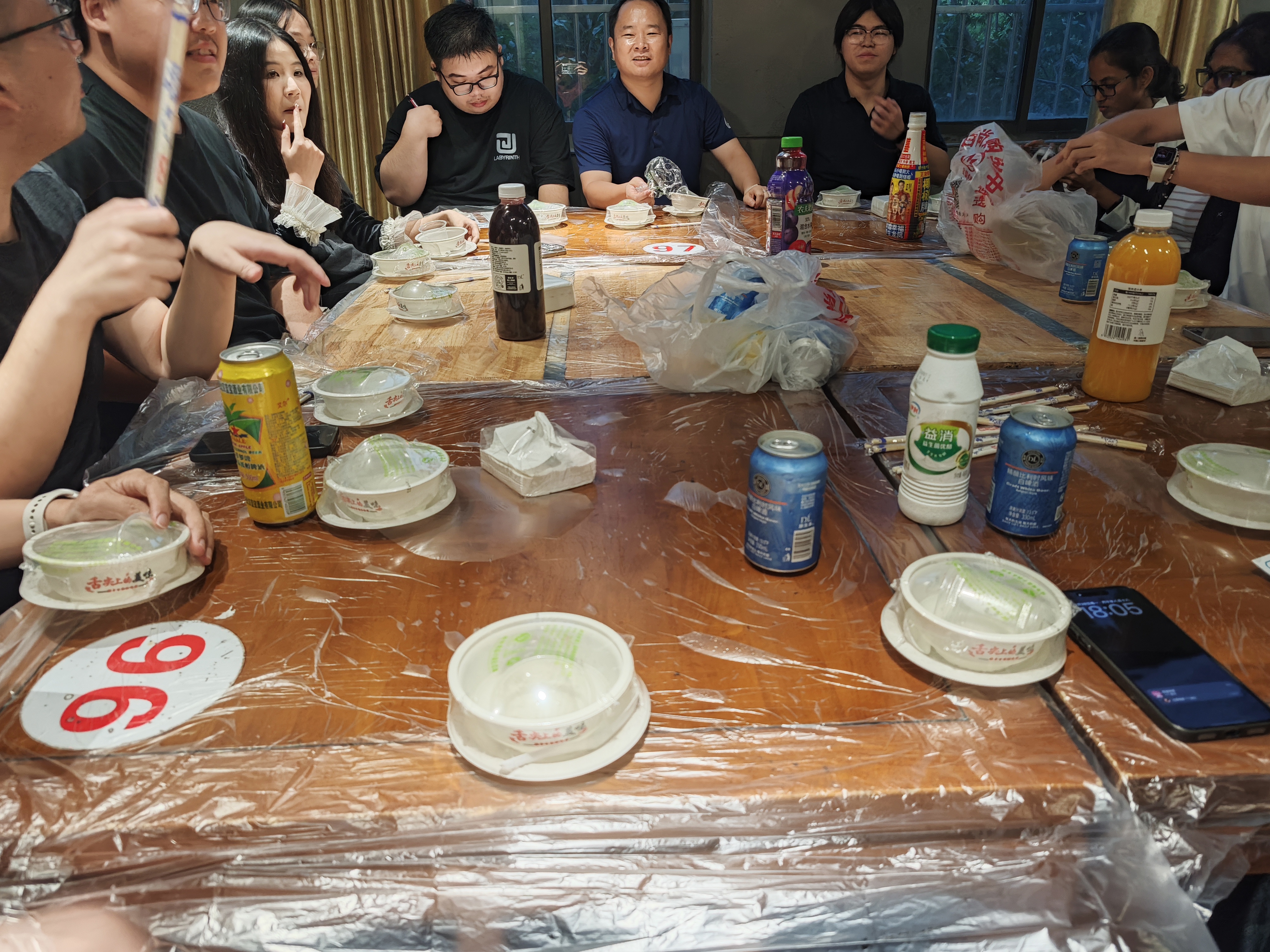 Lab members enjoying a barbecue dinner together